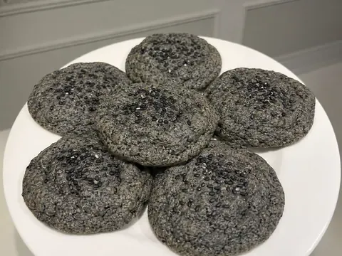 Black Sesame Cookies final image showing soft black sesame cookies with dark speckled dough, chewy centers, lightly crisp edges, sesame seeds on top, and a realistic homemade cookie tray.