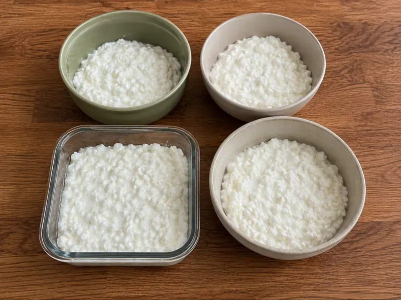 Cottage cheese added to bowls as the creamy base for buffalo chicken bowls.