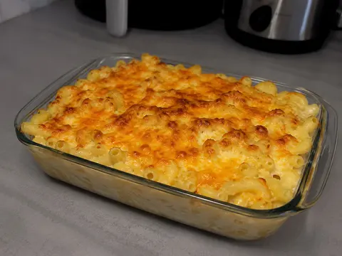 Classic Southern Baked Mac and Cheese in a baking dish with creamy macaroni and a golden cheesy top.