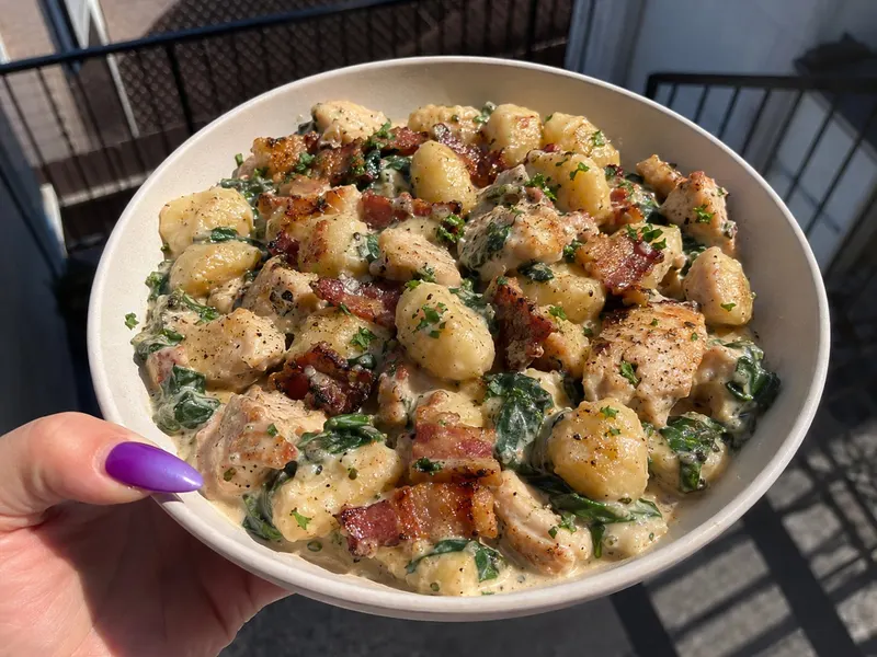 Creamy Chicken and Bacon Gnocchi with the recipe title at the top.