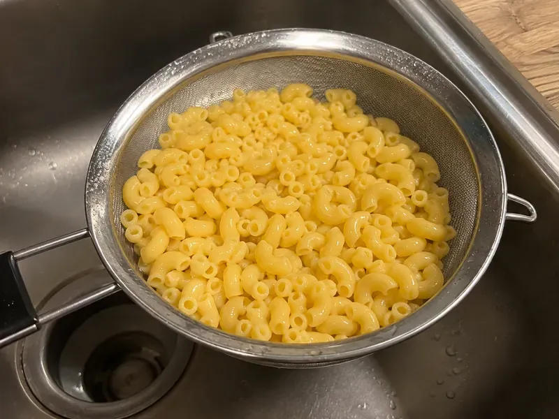 Elbow macaroni cooked slightly under al dente and drained.