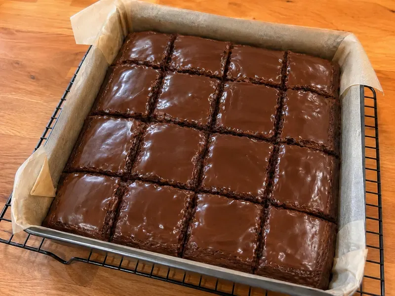 Finished Dr Pepper brownies sliced into fudgy chocolate squares.