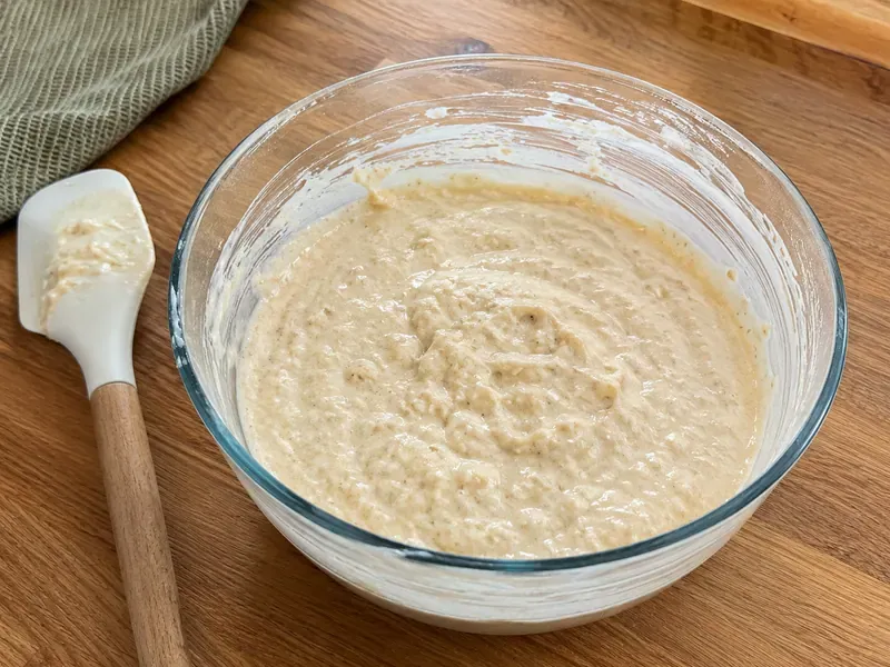 Thick cottage cheese protein pancake batter resting in a bowl or blender cup.