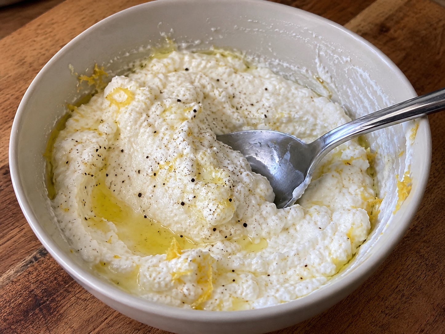 Ricotta mixed with lemon zest, lemon juice, olive oil, salt, and black pepper.