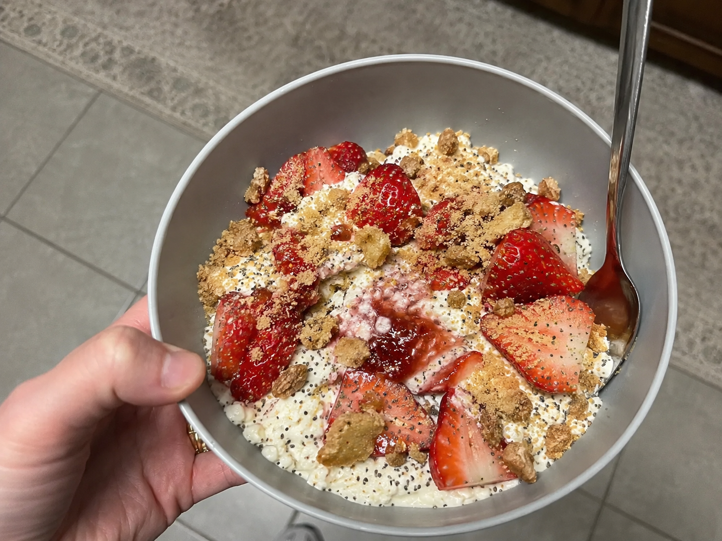 Strawberry cheesecake cottage cheese bowl with strawberries, graham cracker crumbs, and a creamy cottage cheese base.