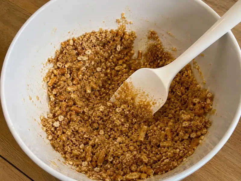 Crushed pretzels mixed with melted butter and brown sugar.