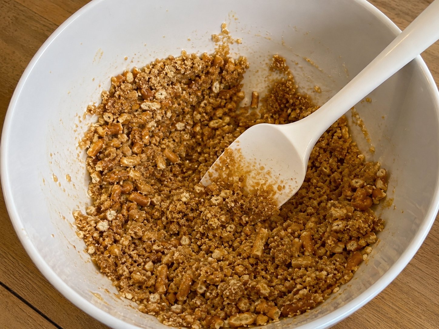 Crushed pretzels mixed with melted butter and brown sugar.