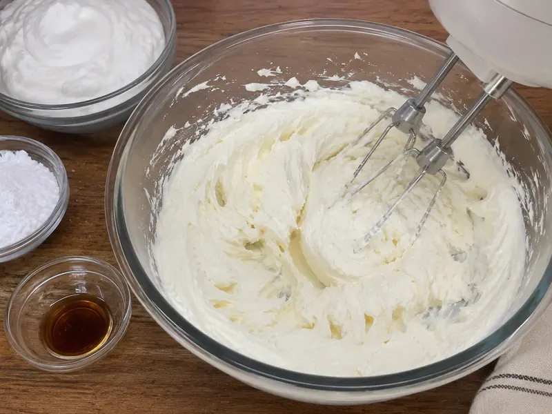 Cream cheese filling mixed with powdered sugar, vanilla, and whipped topping.